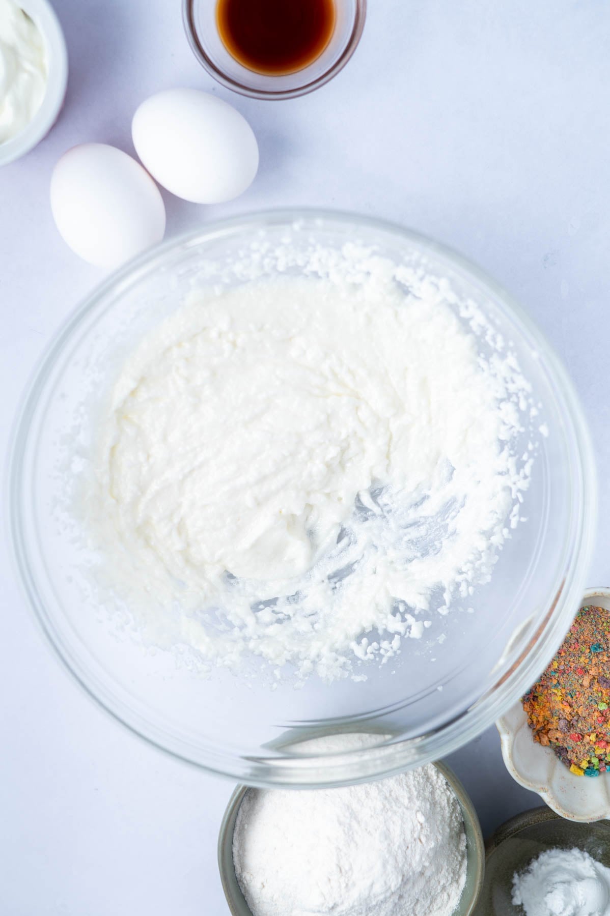 sugar, butter, salt and oil mixed together in a glass bowl