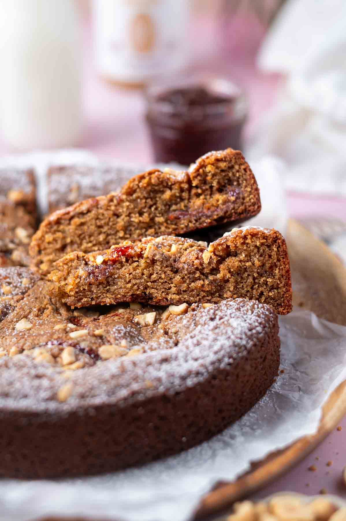 slices of cake showing moist texture on a cake plate