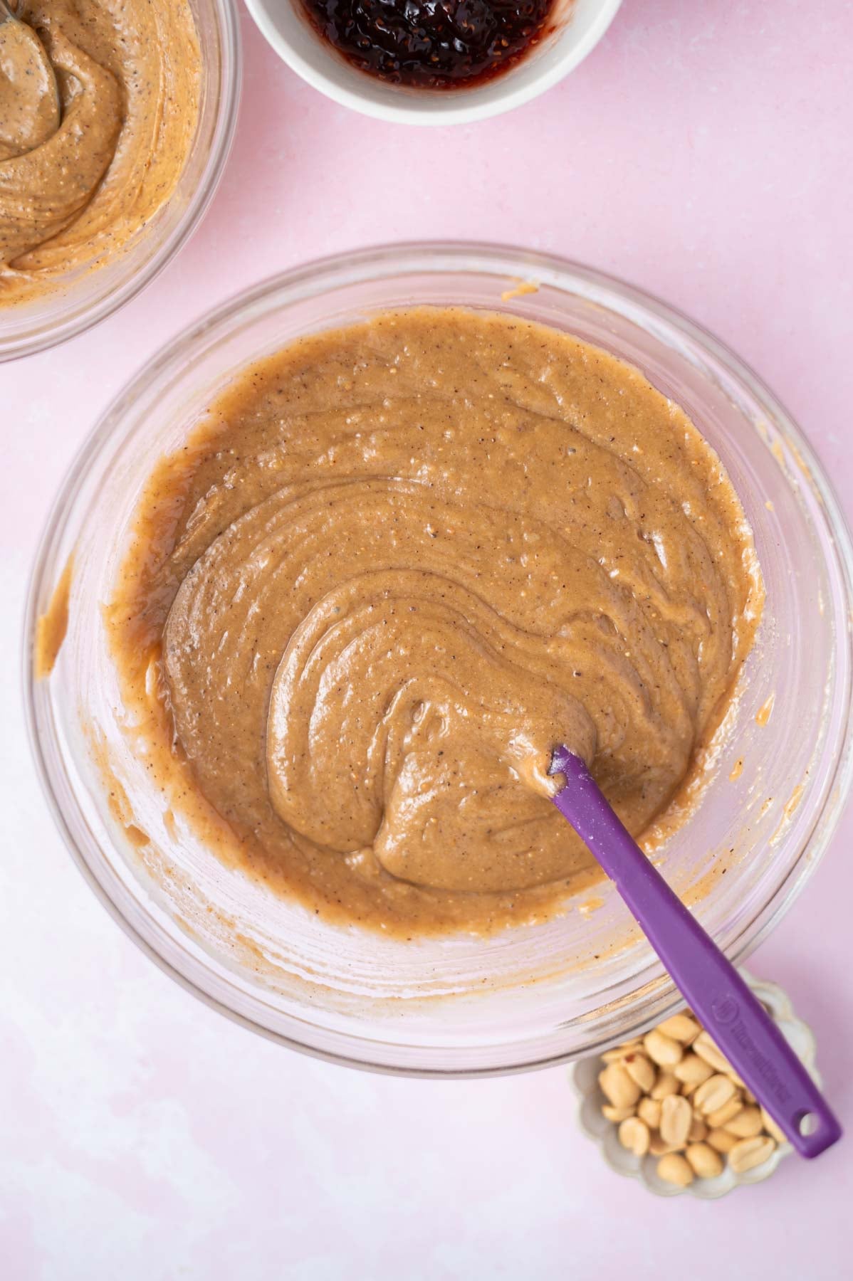 cake batter in a bowl with a spatula