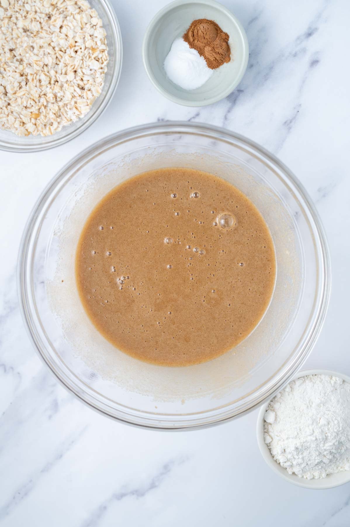 melted butter, sugars, eggs, vanilla and molasses whisked together in a bowl