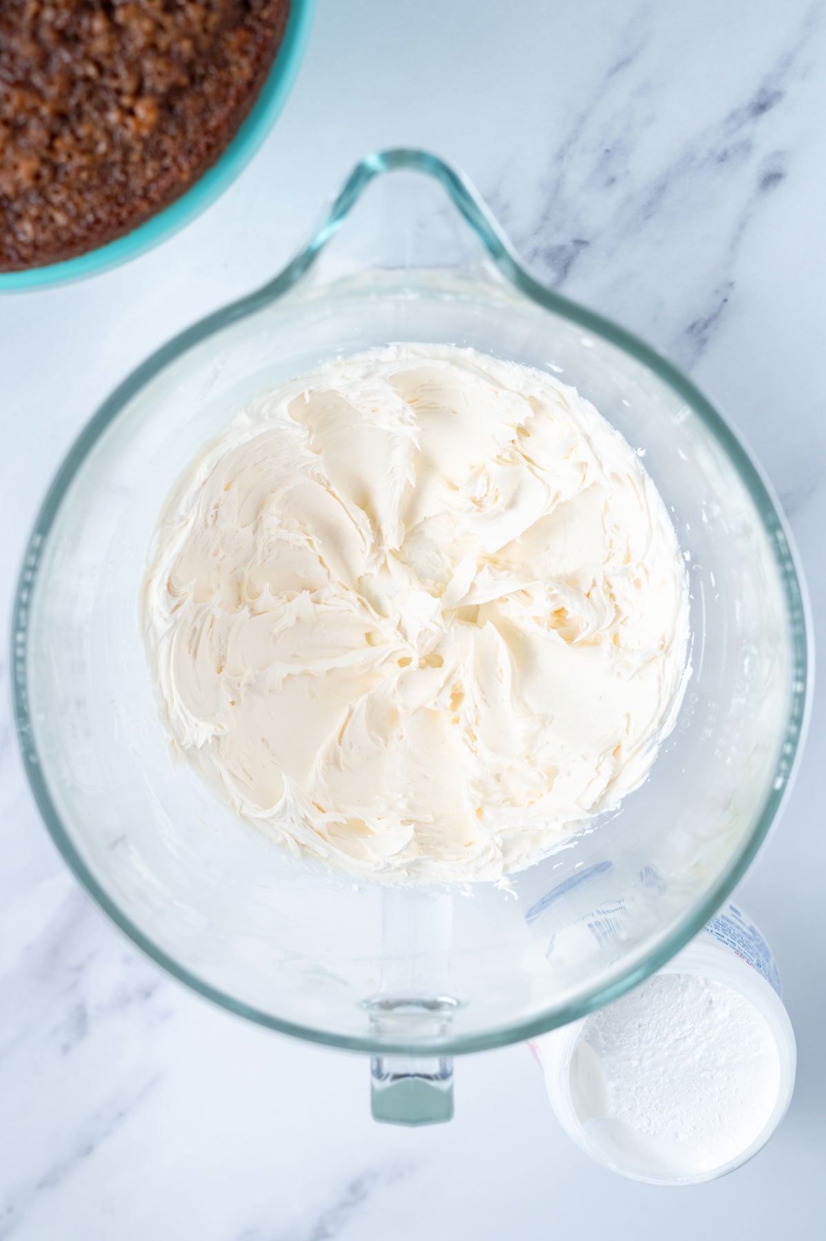 butter and confectioners' sugar beaten together in a glass mixing bowl