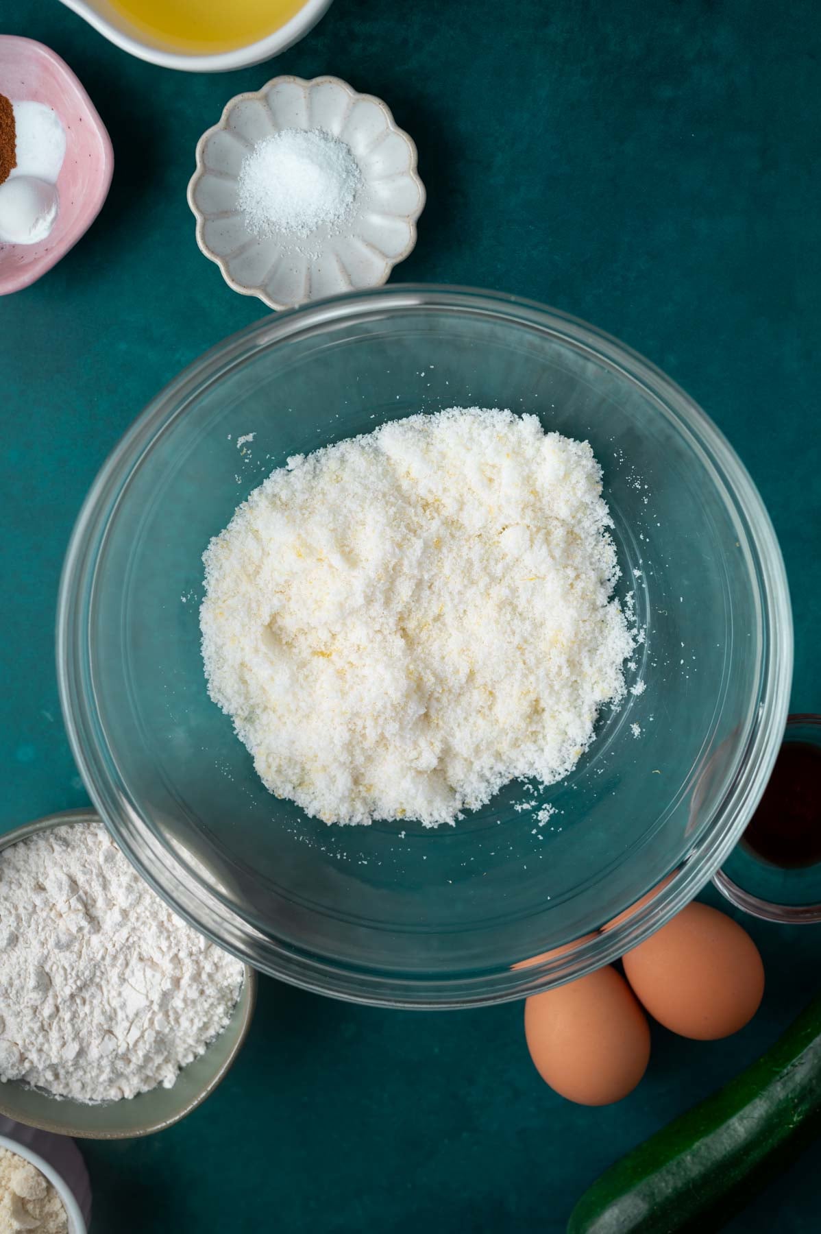 sugar with lemon zest worked into it in a bowl