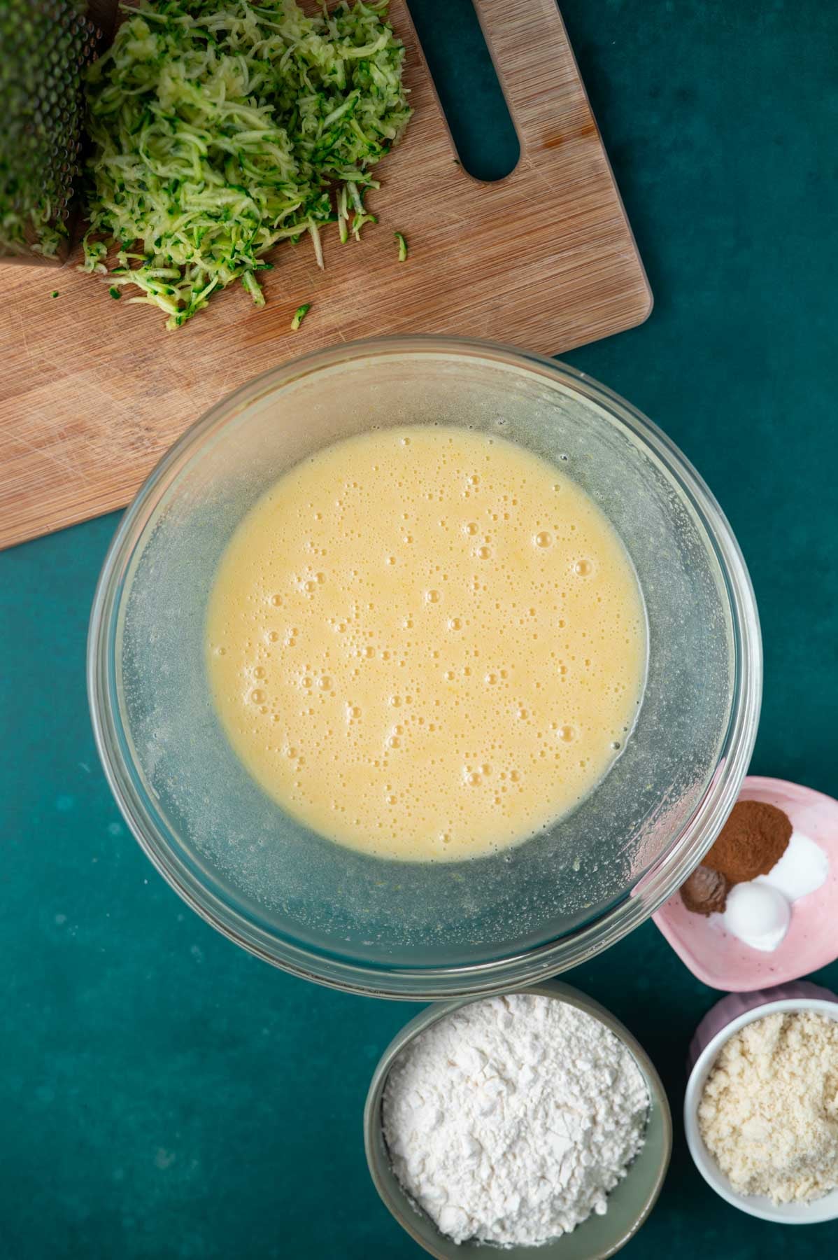 butter, sugar and eggs whisked together in a bowl