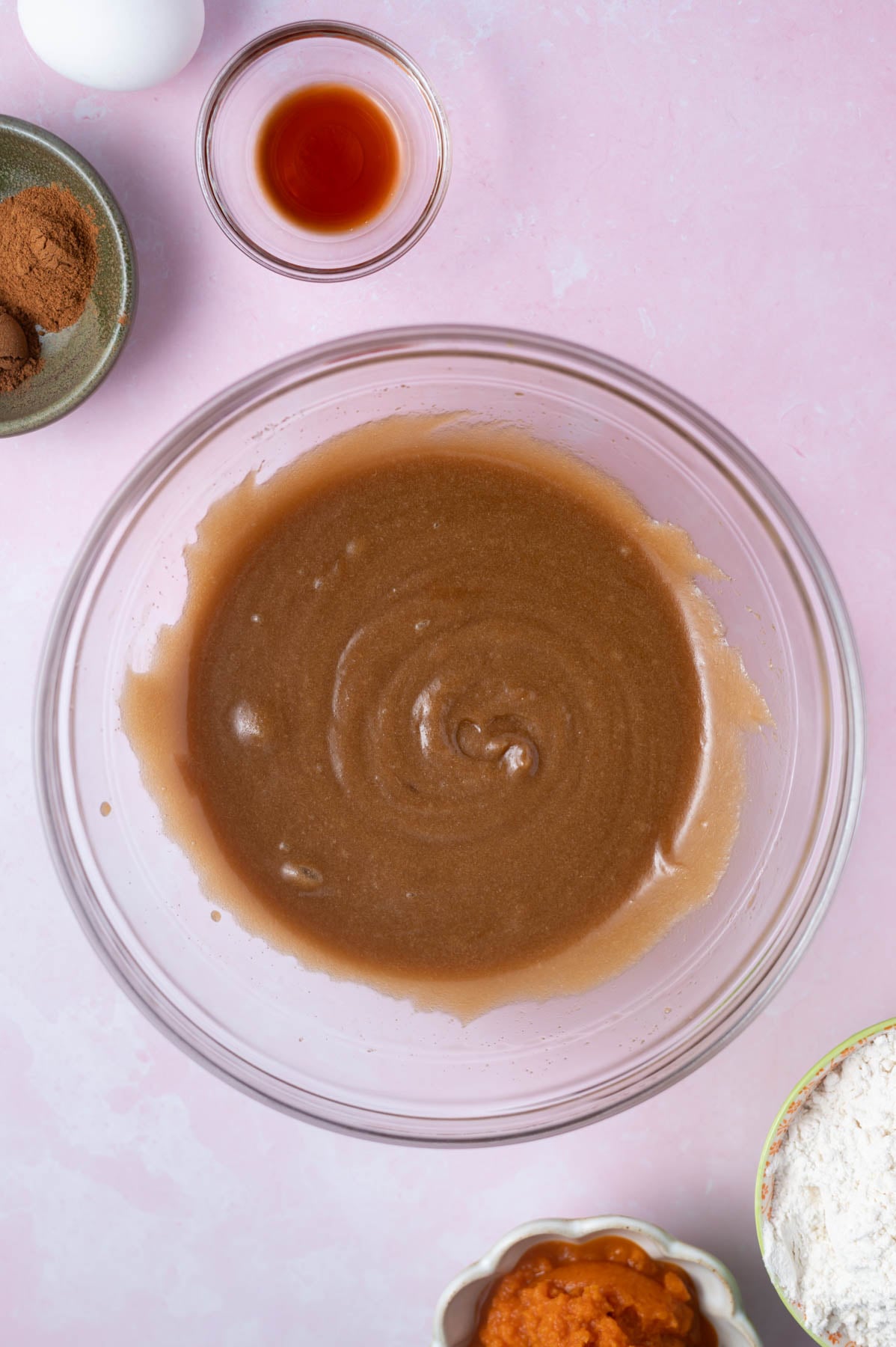 butters and sugars whisked together in a bowl