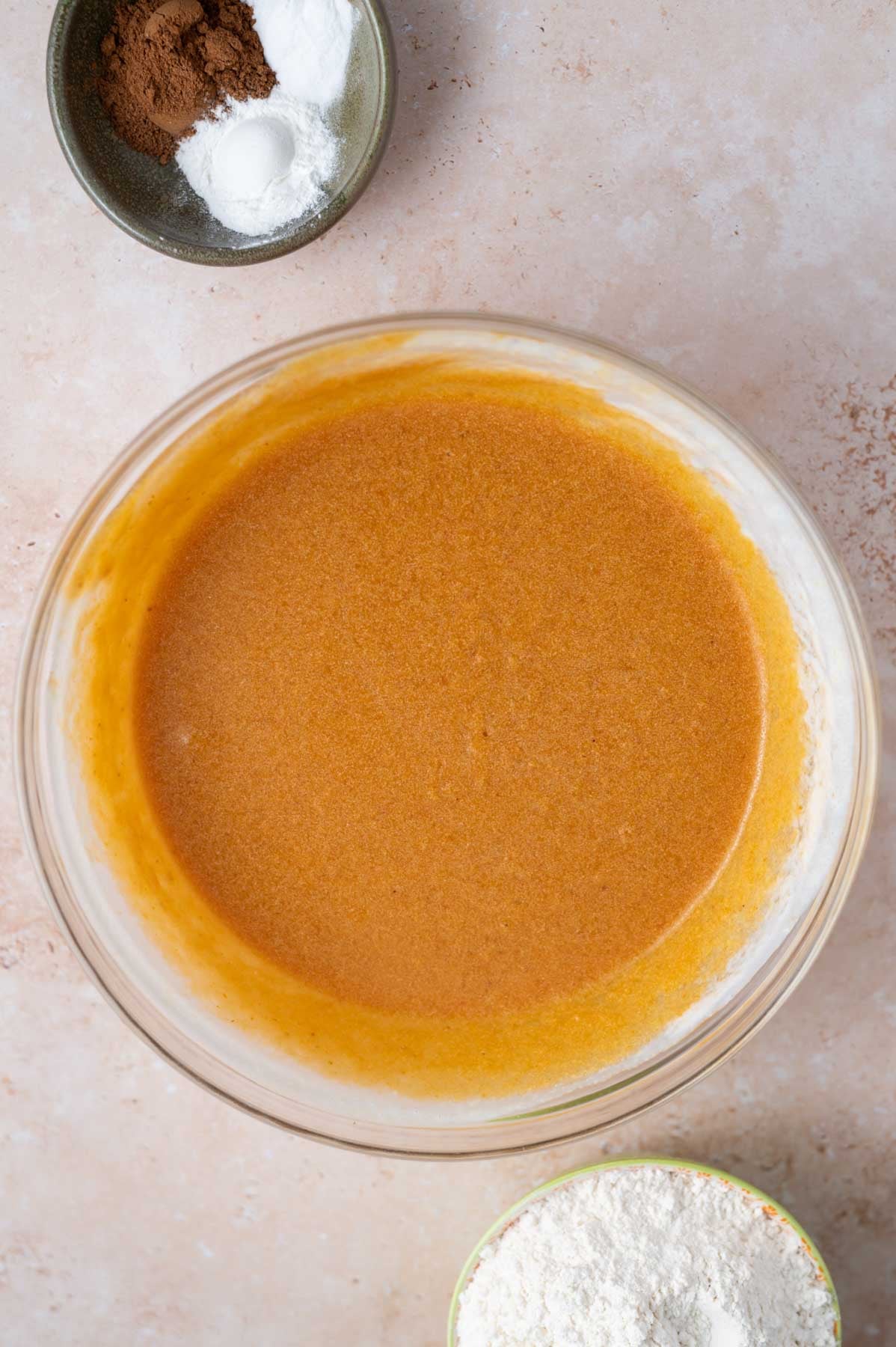 buttermilk whisked into batter in a mixing bowl