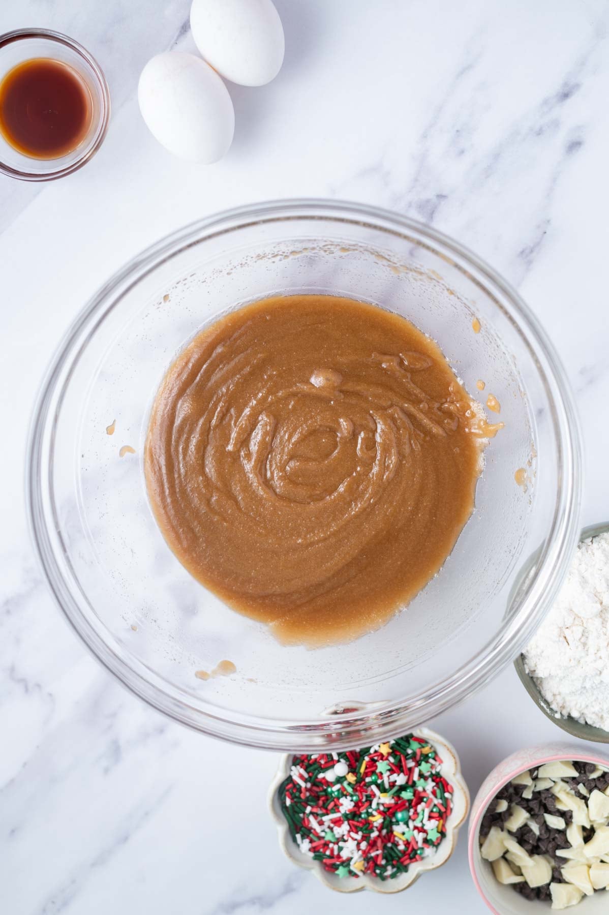 melted butter, brown sugar, granulated sugar, and kosher salt whisked together in bowl
