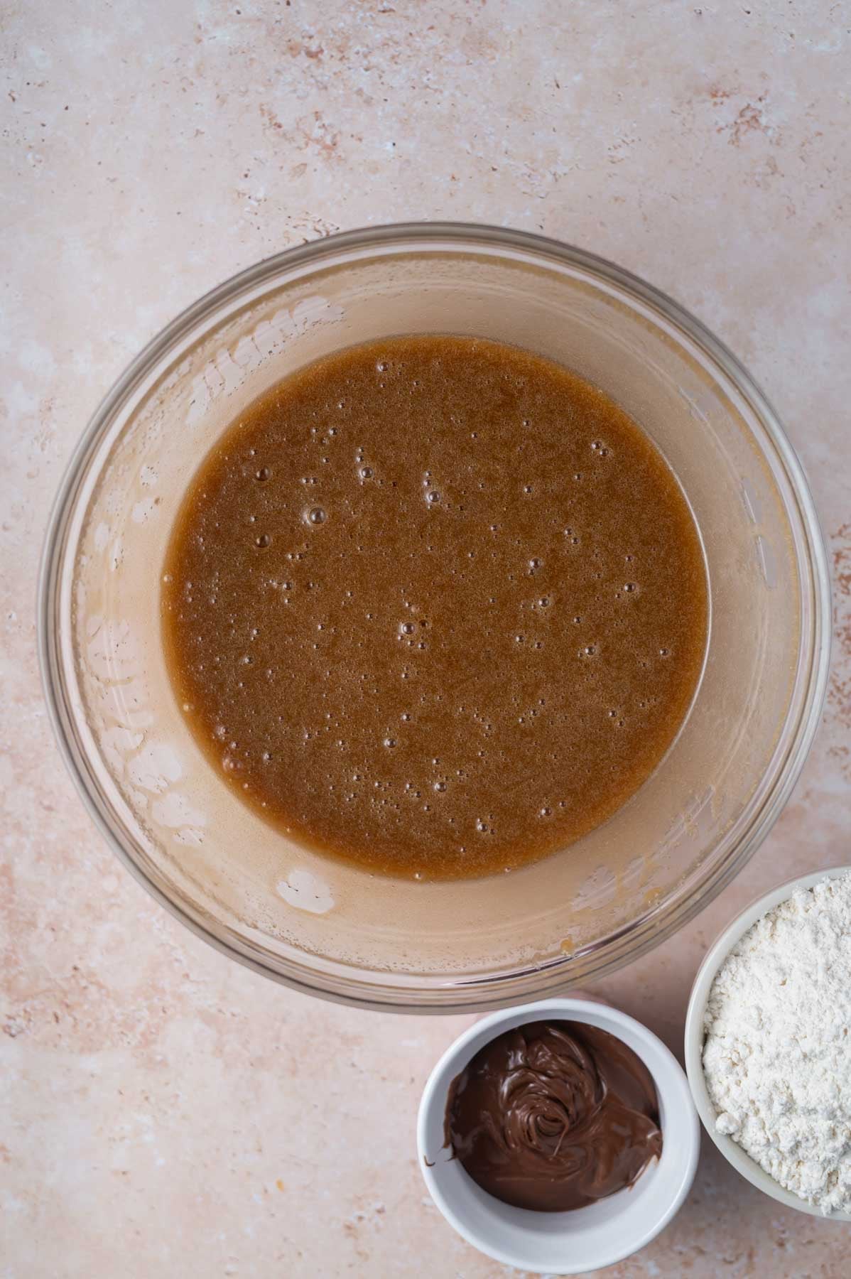 eggs, sugars, melted butter, vanilla and salt whisked together in a glass bowl