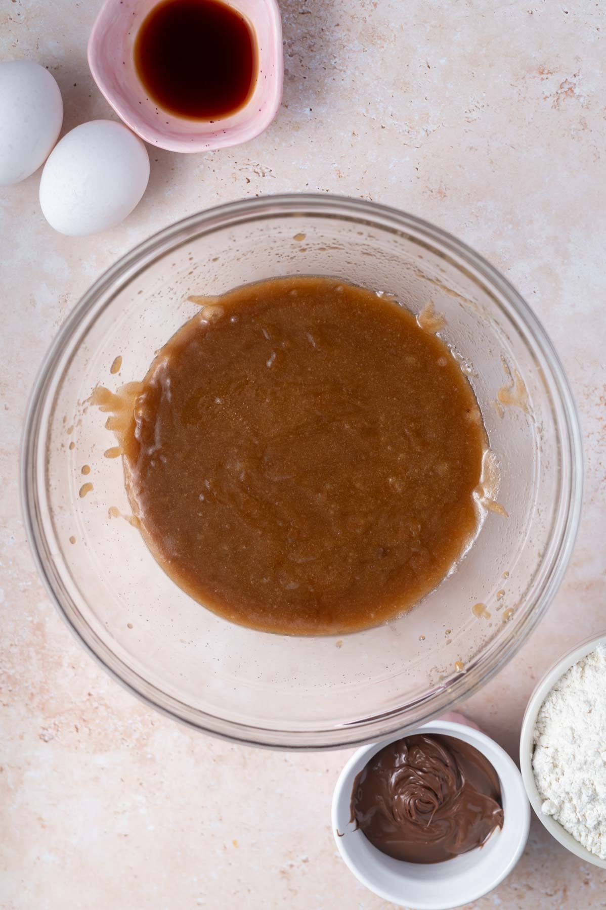 sugars, salt and butter whisked together in a glass bowl